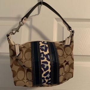 Brand new blue cheetah Coach bag